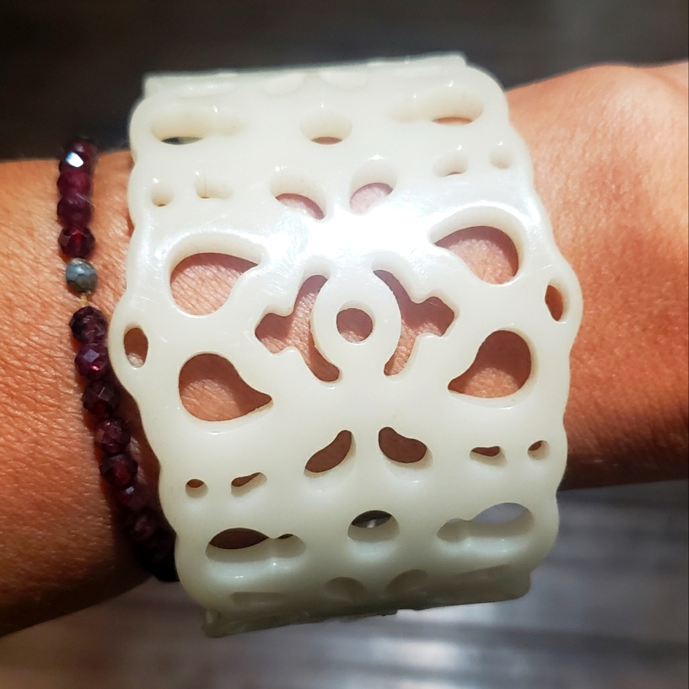 Vintage cutout ivory-colored, acrylic/acetate large bracelet cuff. Mod